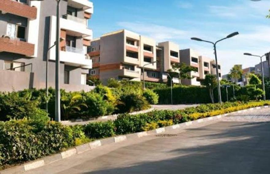 Apartment with garden for sale in Zayed Regency 