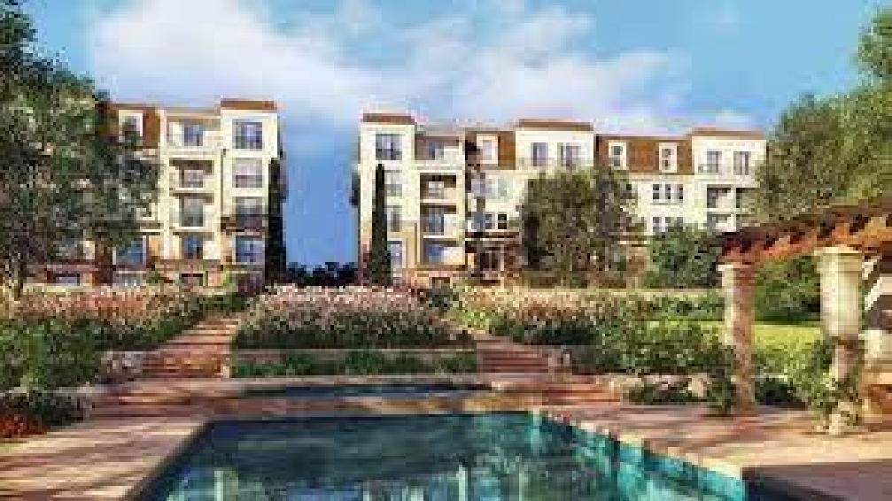 sarai new cairo , flat with garden for sale
